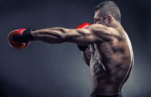 Boxer with boxing red gloves