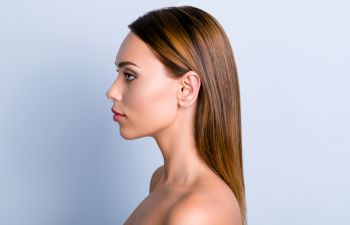Profile of a young beautiful woman.